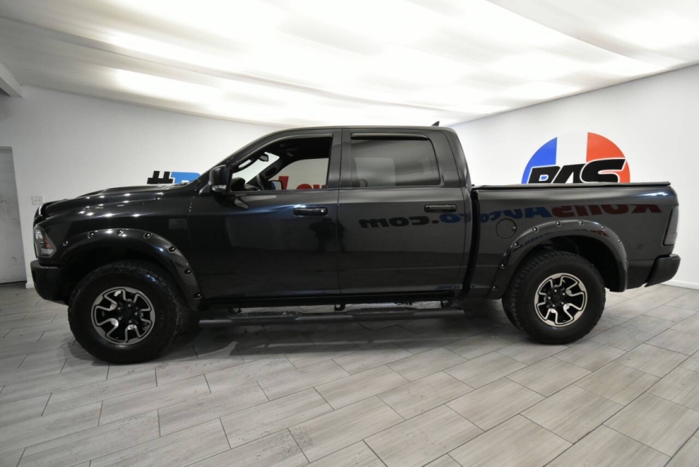 2016 RAM 1500 Rebel 4x4 4dr Crew Cab 5.5 ft. SB Pickup, Black, Mileage: 97,929 - photo 1