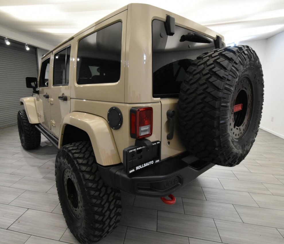 2016 Jeep Wrangler Unlimited Rubicon, Tan, Mileage: 42,897 - photo 2